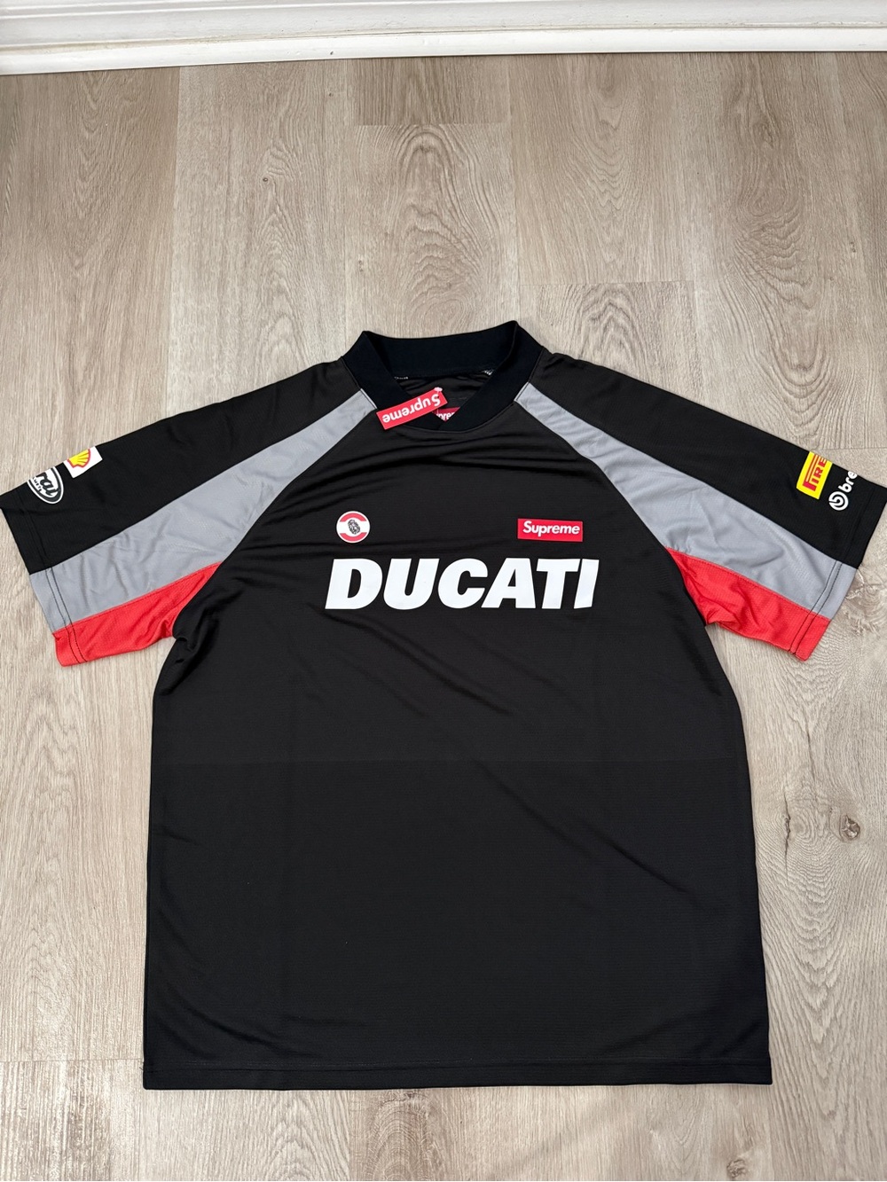 Supreme Ducati Black Tee with Gray and Red Accents